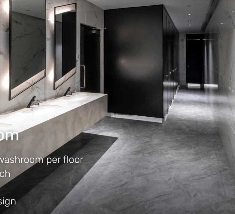 Text reads 'Female Washroom'; marble-tiled bathroom with multiple sinks, mirrors, and a black divider wall along the counter.